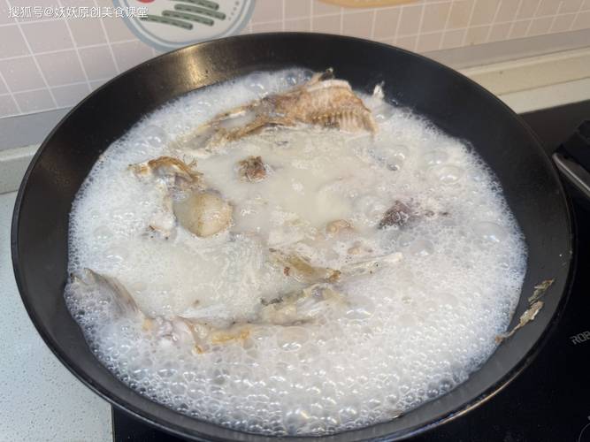 魚頭豆腐湯正宗做法_煮魚頭豆腐湯做法_豆腐魚頭湯