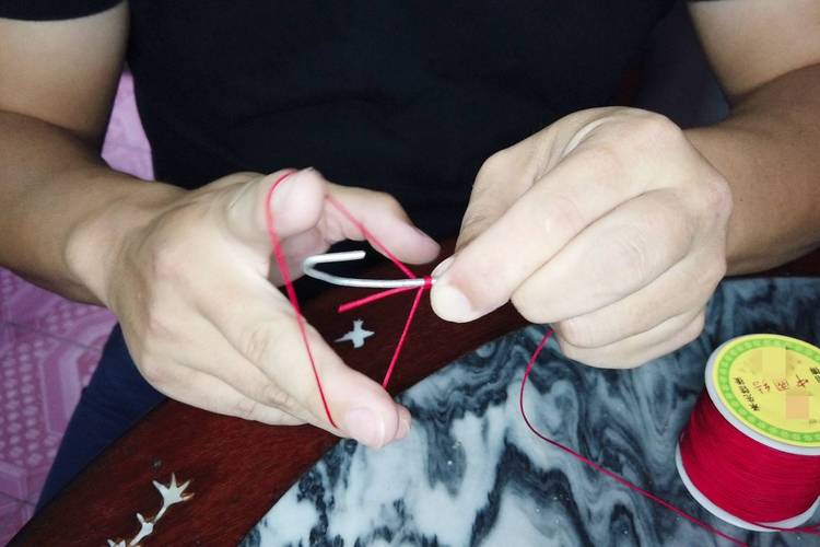 綁魚鉤_綁魚鉤方法_改良型結綁魚鉤教程